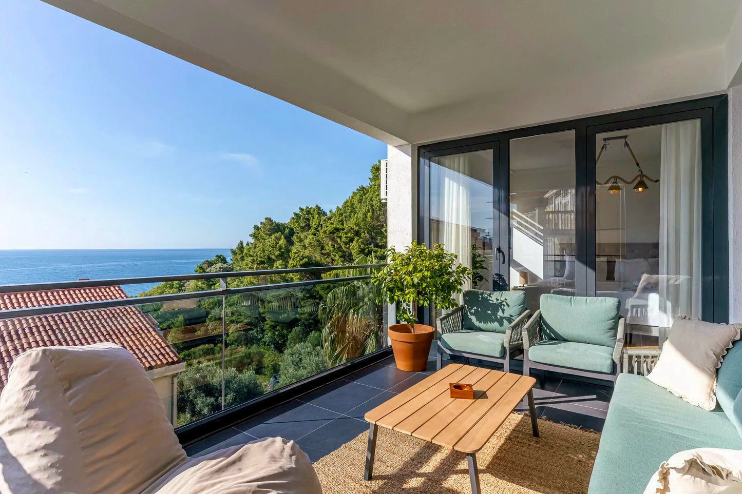 Elegant 3-Bedroom Sea View Apartment in Sveti Stefan with Terrace and Parking
