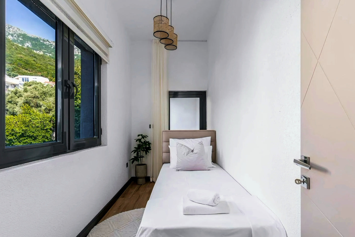 Elegant 3-Bedroom Sea View Apartment in Sveti Stefan with Terrace and Parking